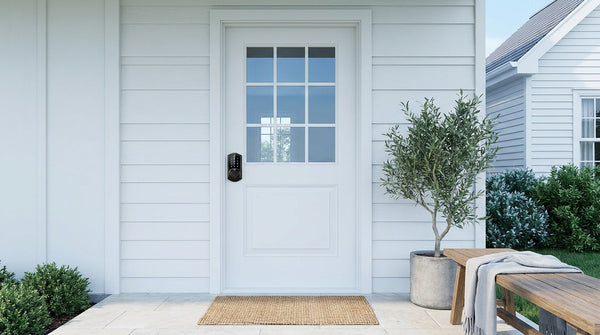 White 9-pane glass front door with Veise fingerprint smart deadbolt — smart lock troubleshooting fix guide